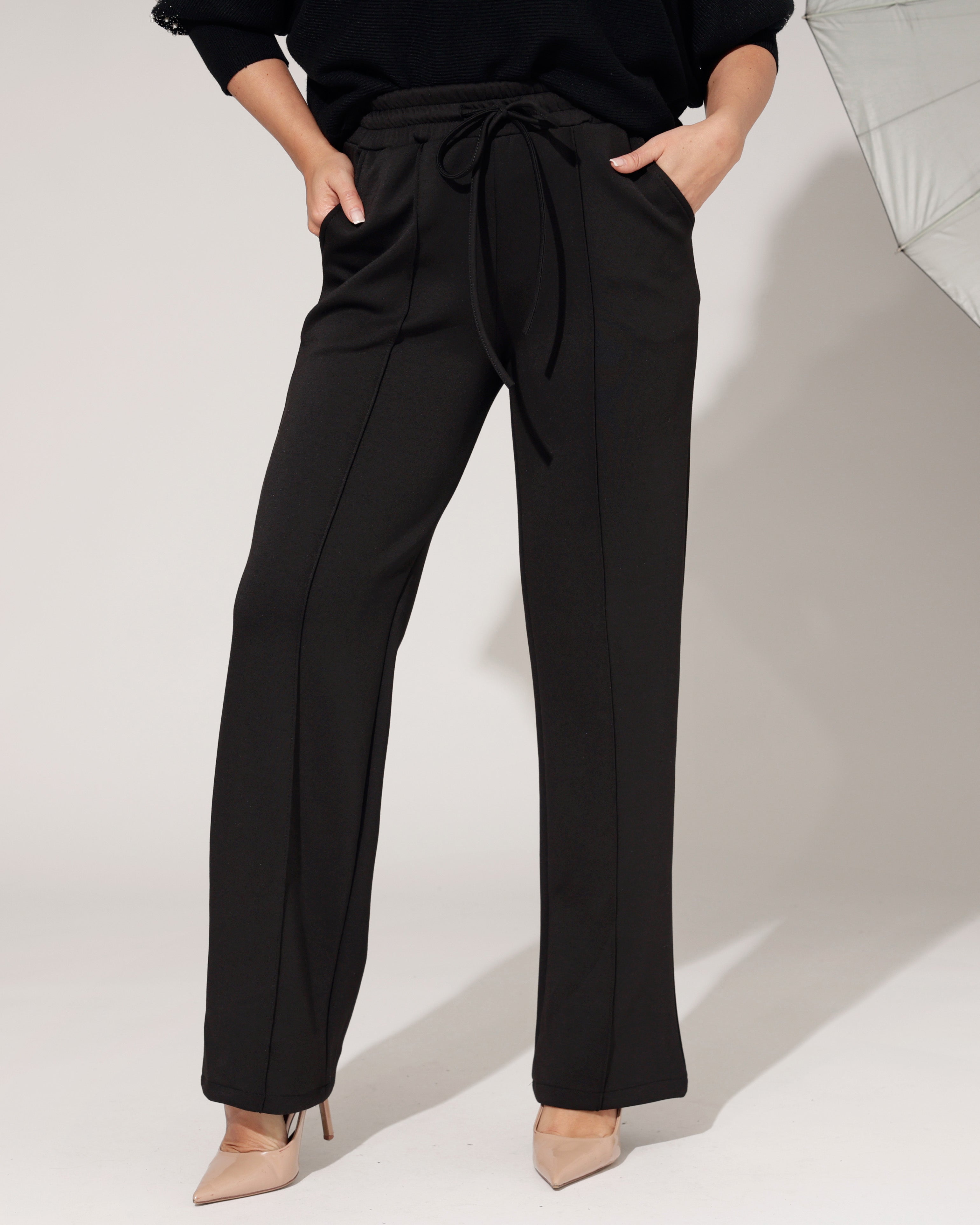 De perfecte goedkope zwarte broek: waar let je op en welke past bij jou?