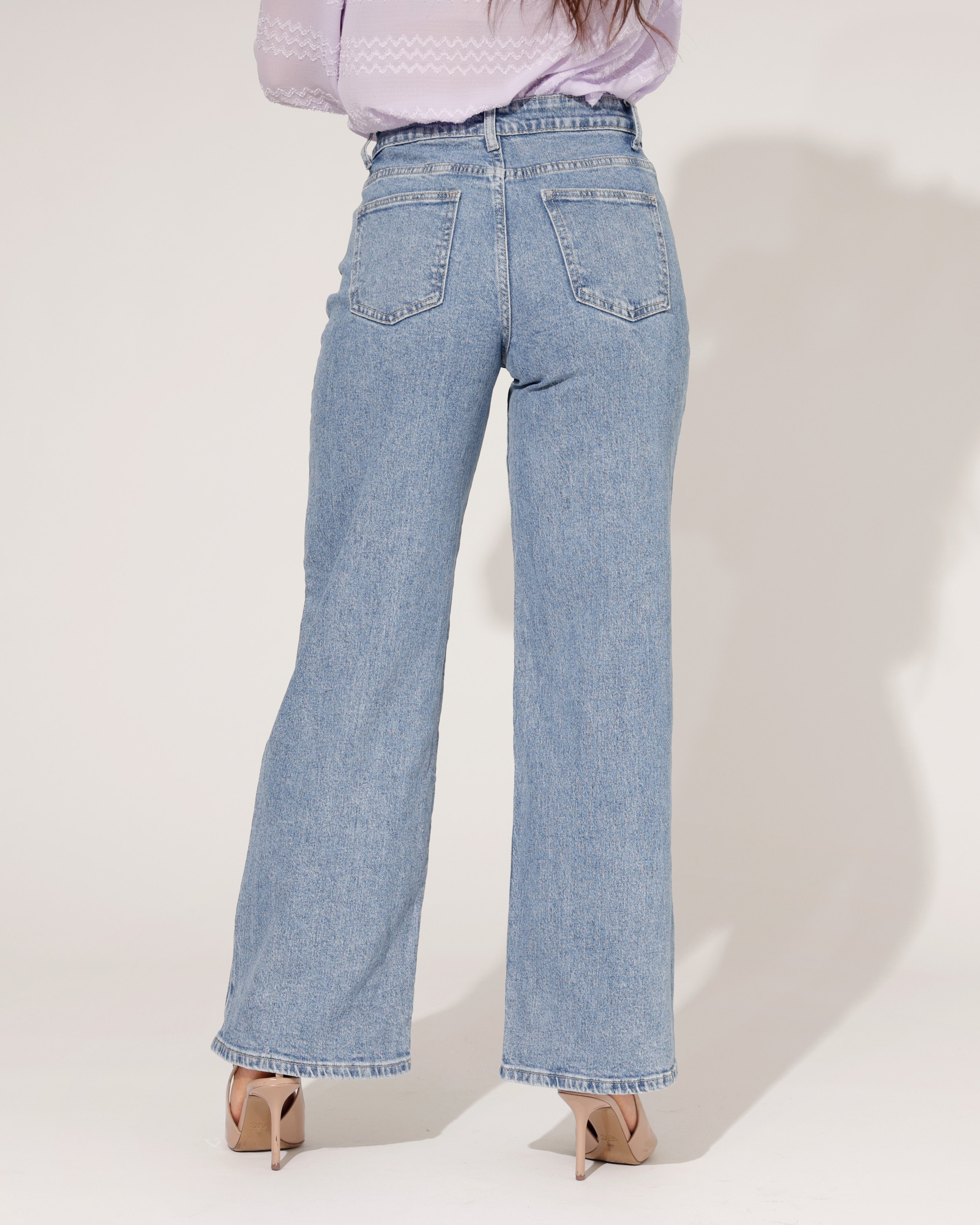 Stoere blauwe wide leg jeans dames Hello Miss - achterkant