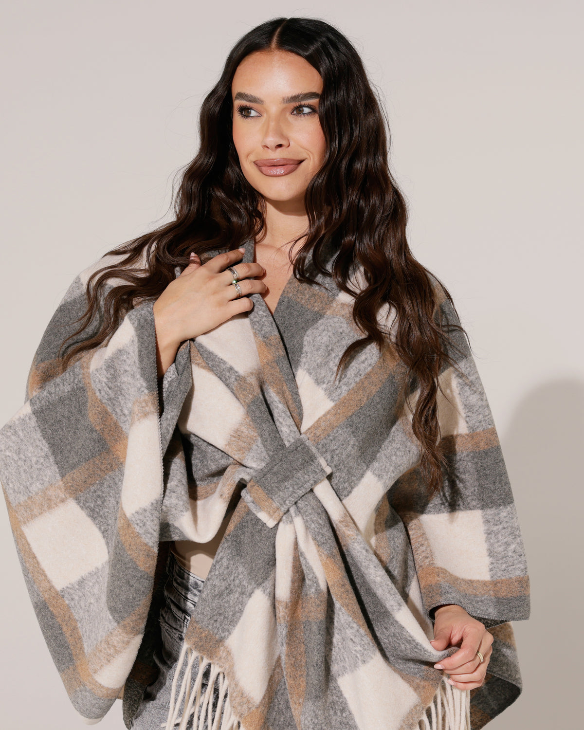 Geruite poncho Lize Grijs