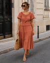 Off-shoulder jurk Noor Koraal