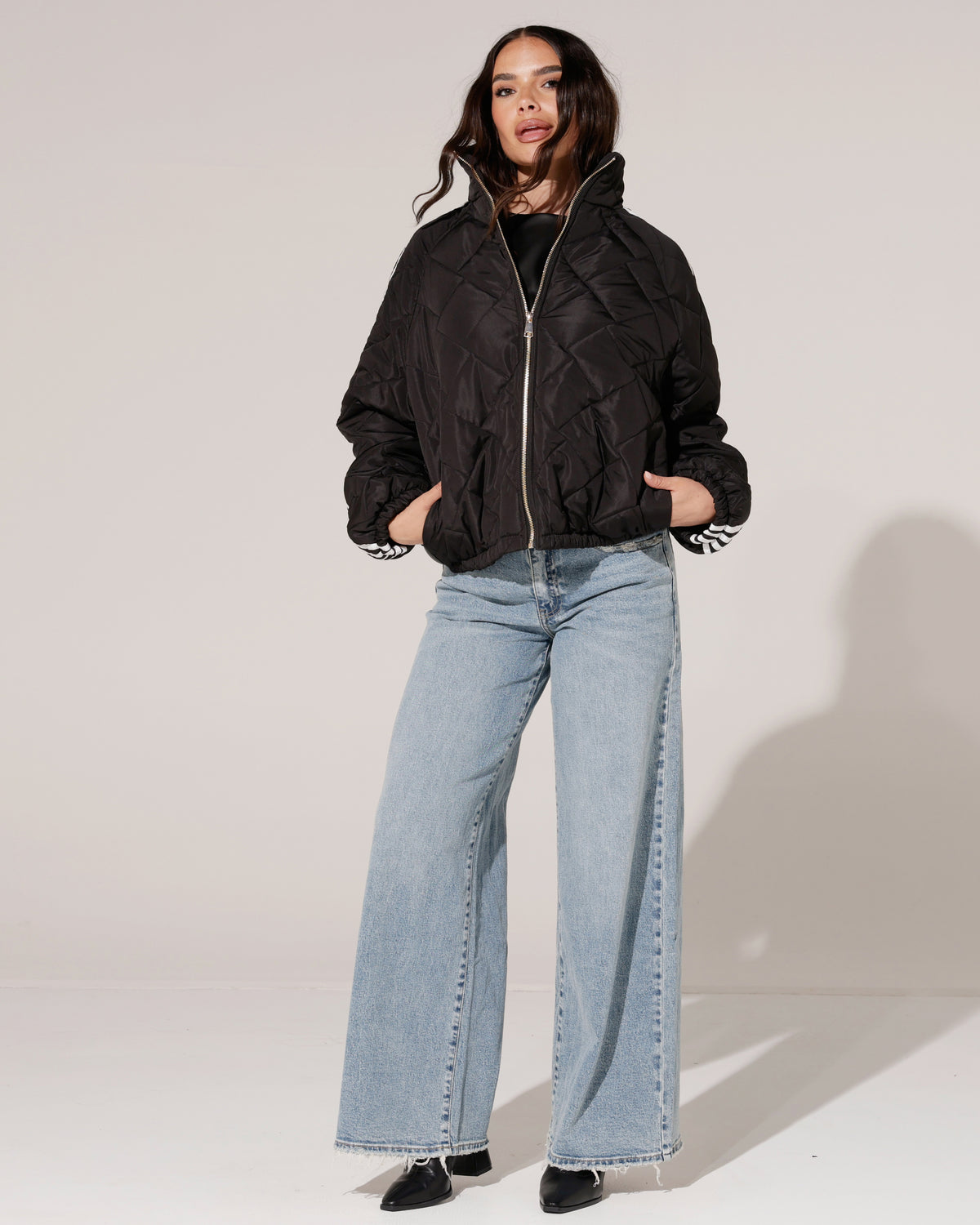 Gewatteerd bomberjacket met strepen Revy Zwart