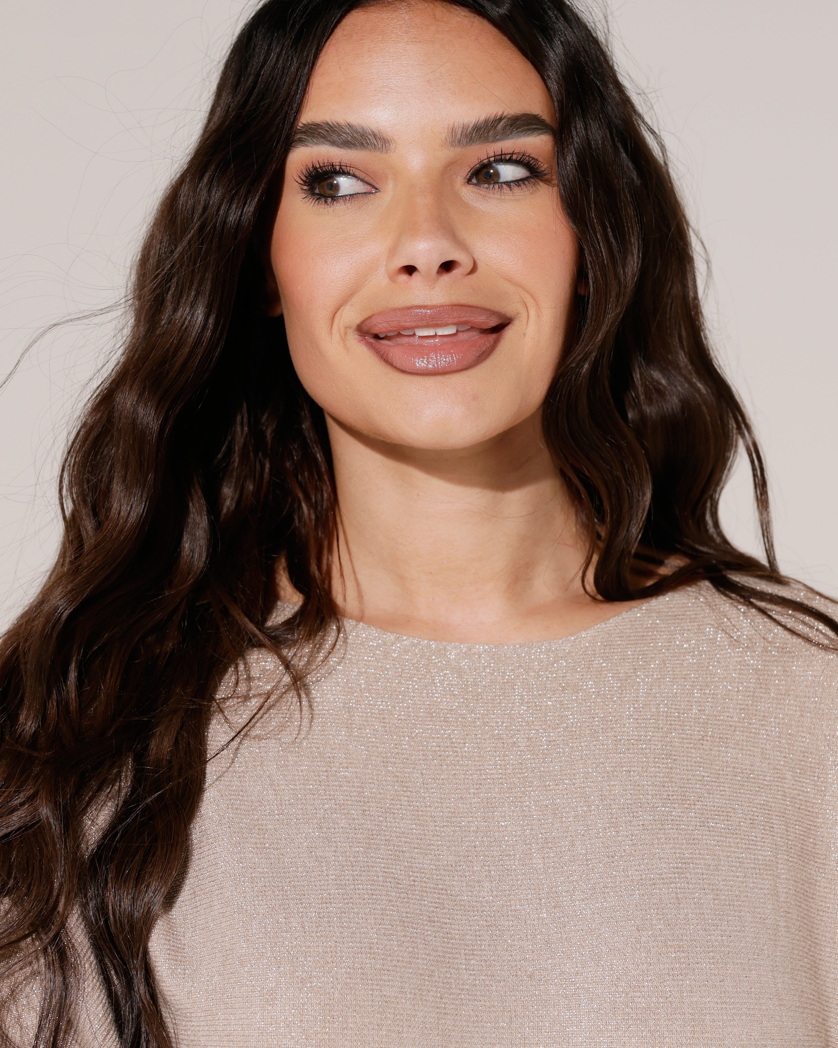 Top vleermuis mouwen en glitter Teddy Zand