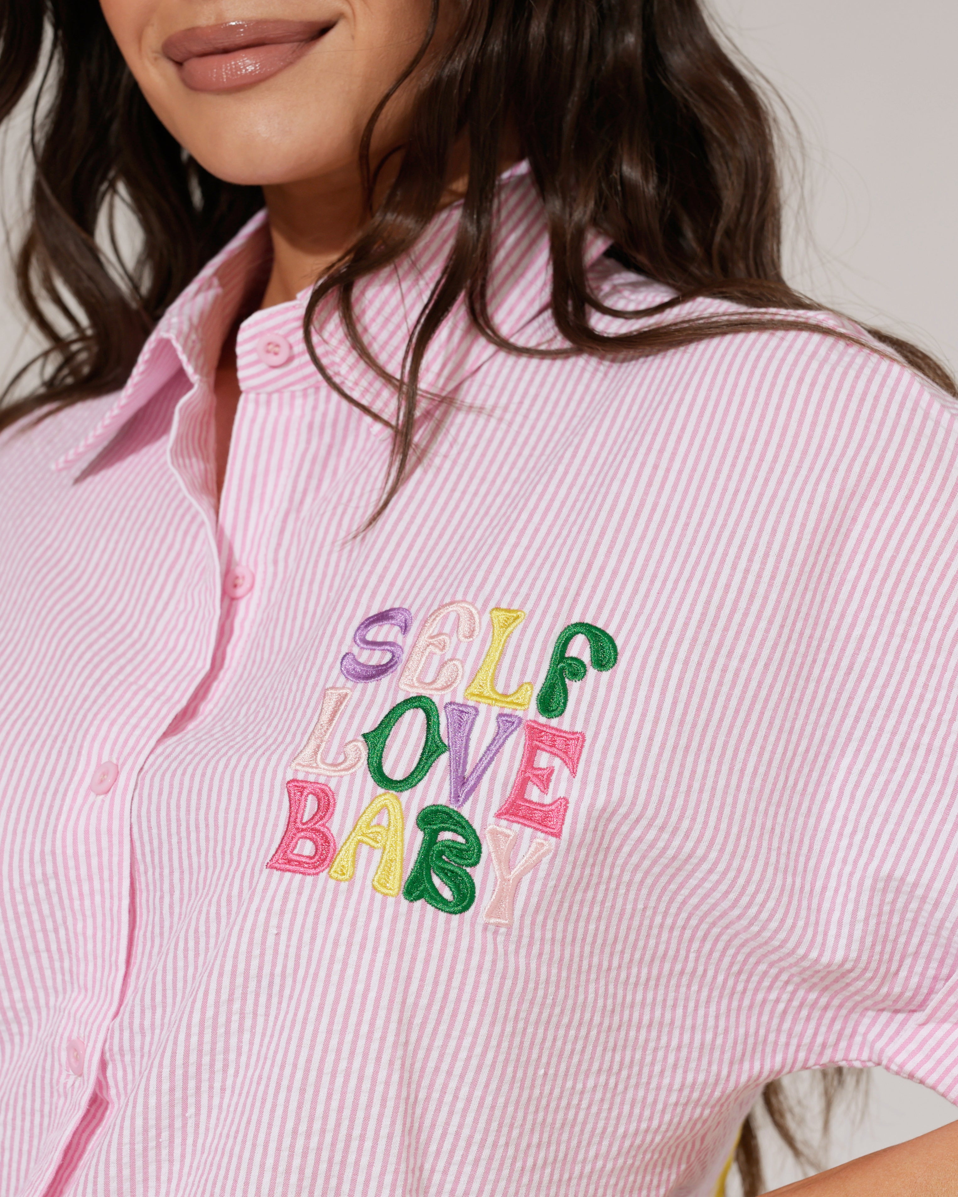 Gestreepte blouse Self love Roze