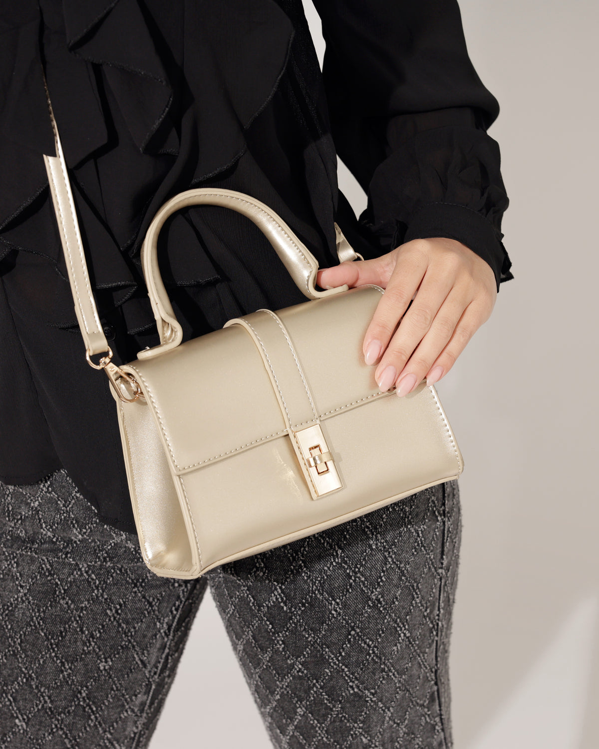 Tas Rosina in goud